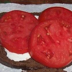 Location: MoonDance Farm, NC
Date: July 2003
Sliced Abe Lincoln on pumperknickel bread: The Perfect Tomato San
